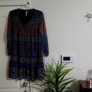 Size L multi color dress long sleeves with crisscross tie strings and V-neck$12.